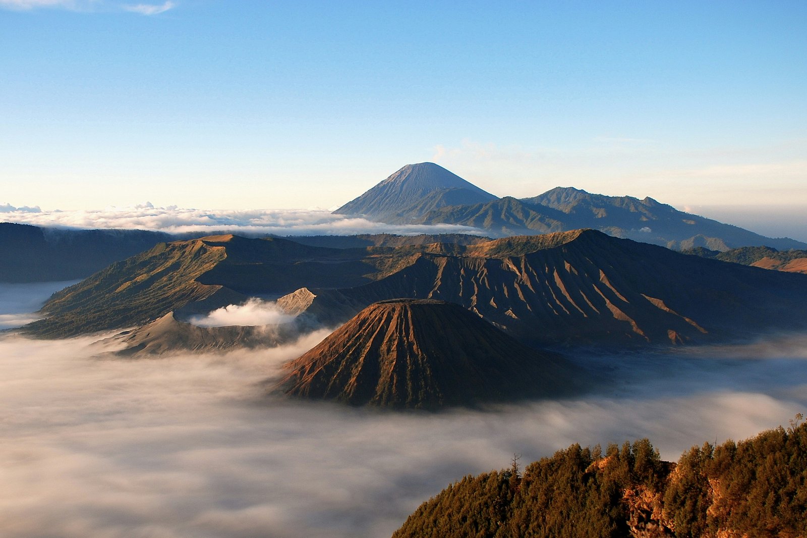 Sunrise over the Tengger Caldera from Penanjakan viewpoint with four volcanoes