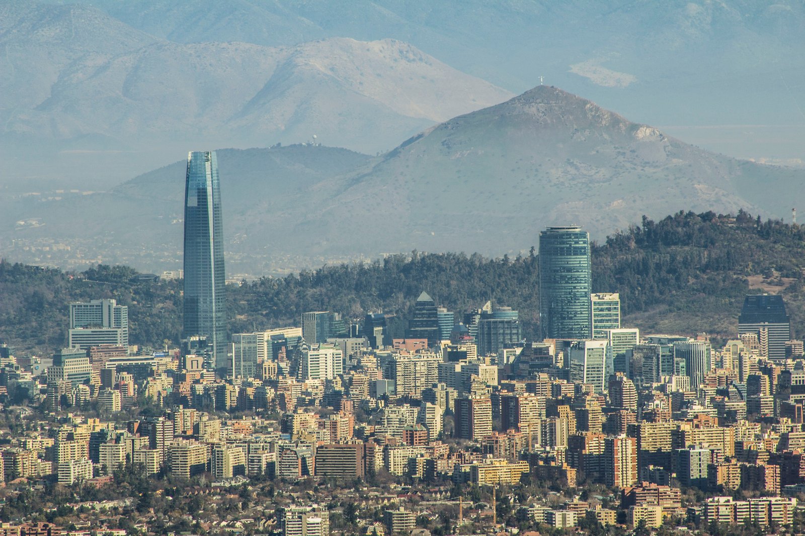 Santiago skyline with the Gran Torre and the Andes rising behind the city
