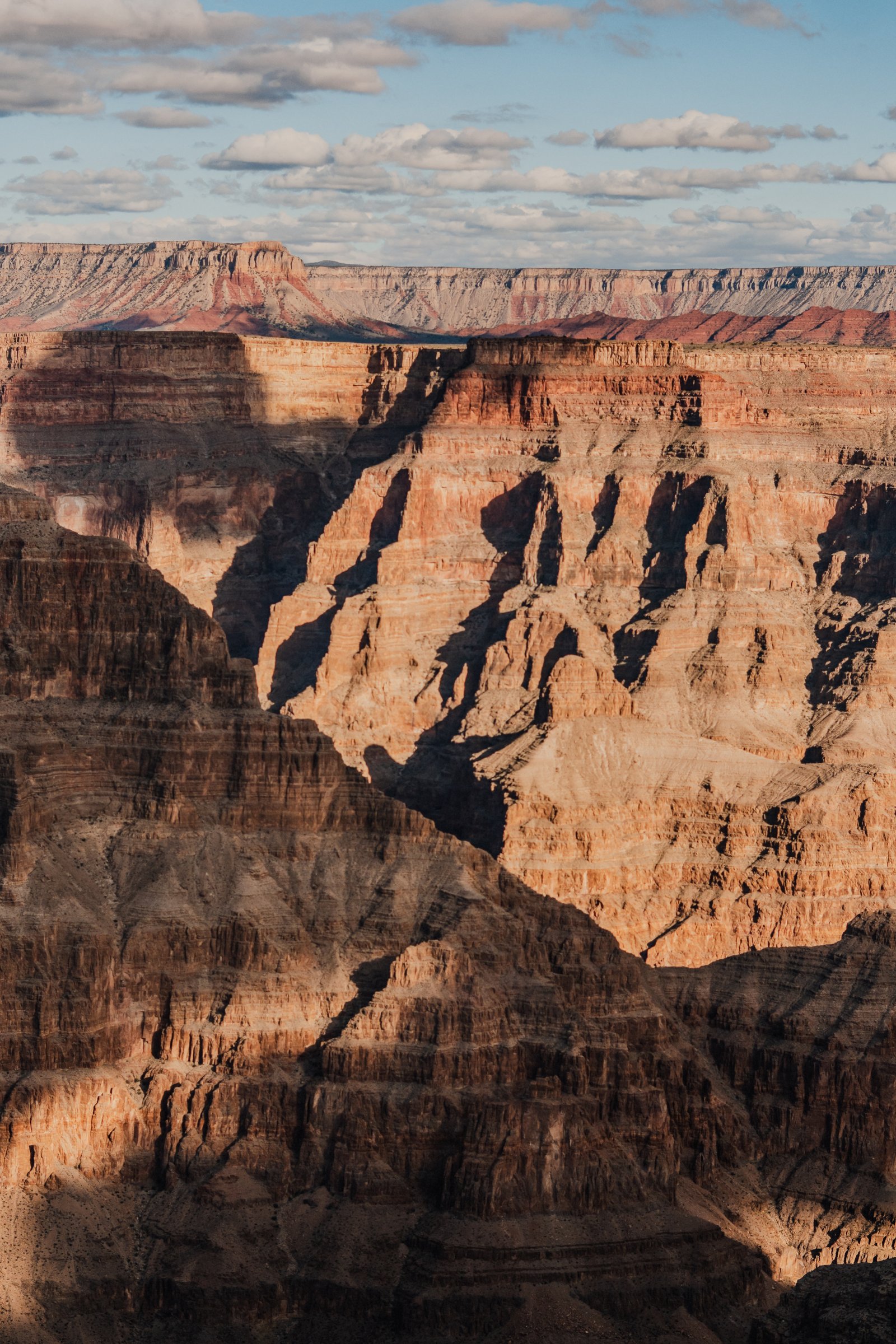 Dusk. The lower sections go dark first. The rim holds the light longest.