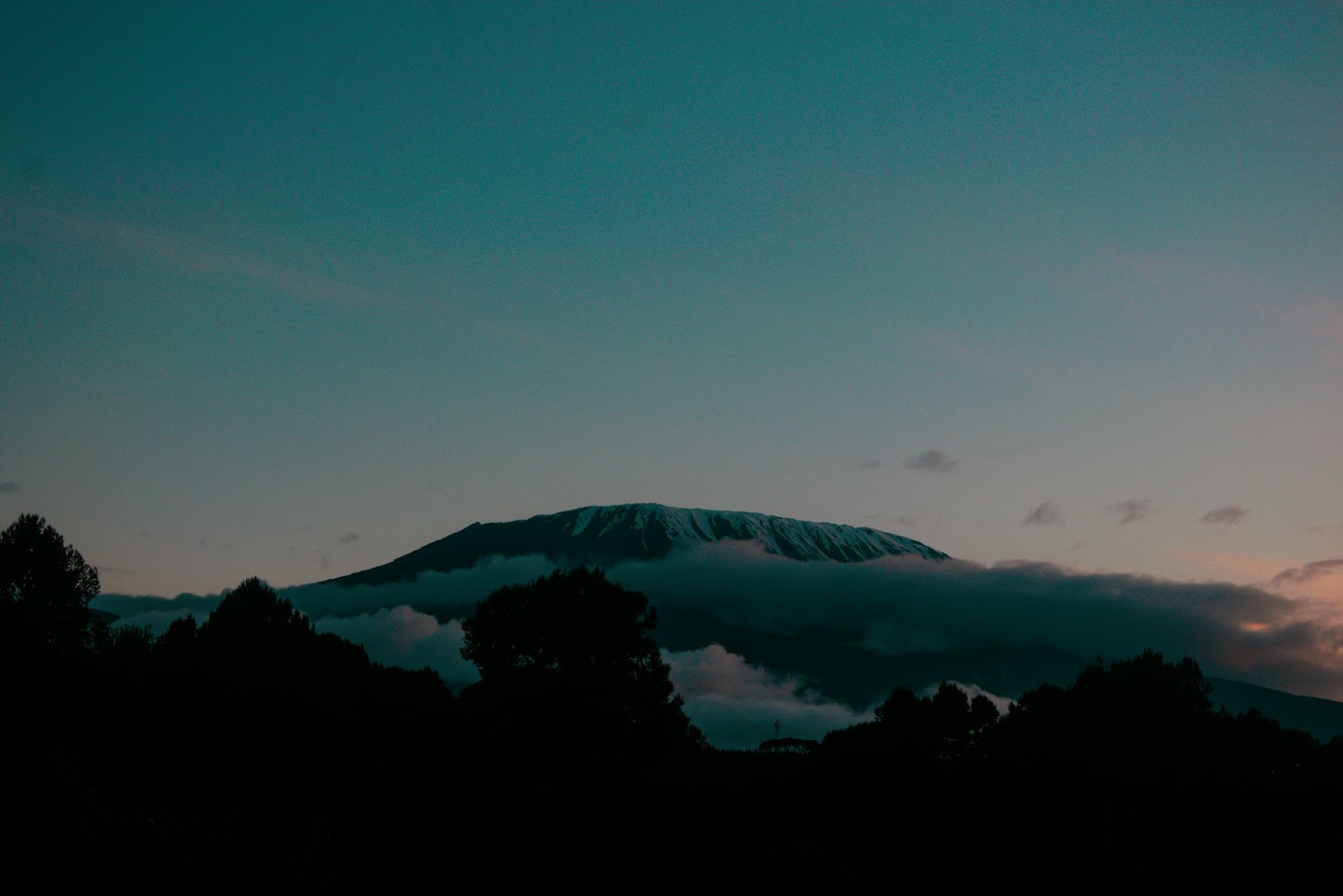 Kibo cone summit section with headlamp strings of climbers at 3am