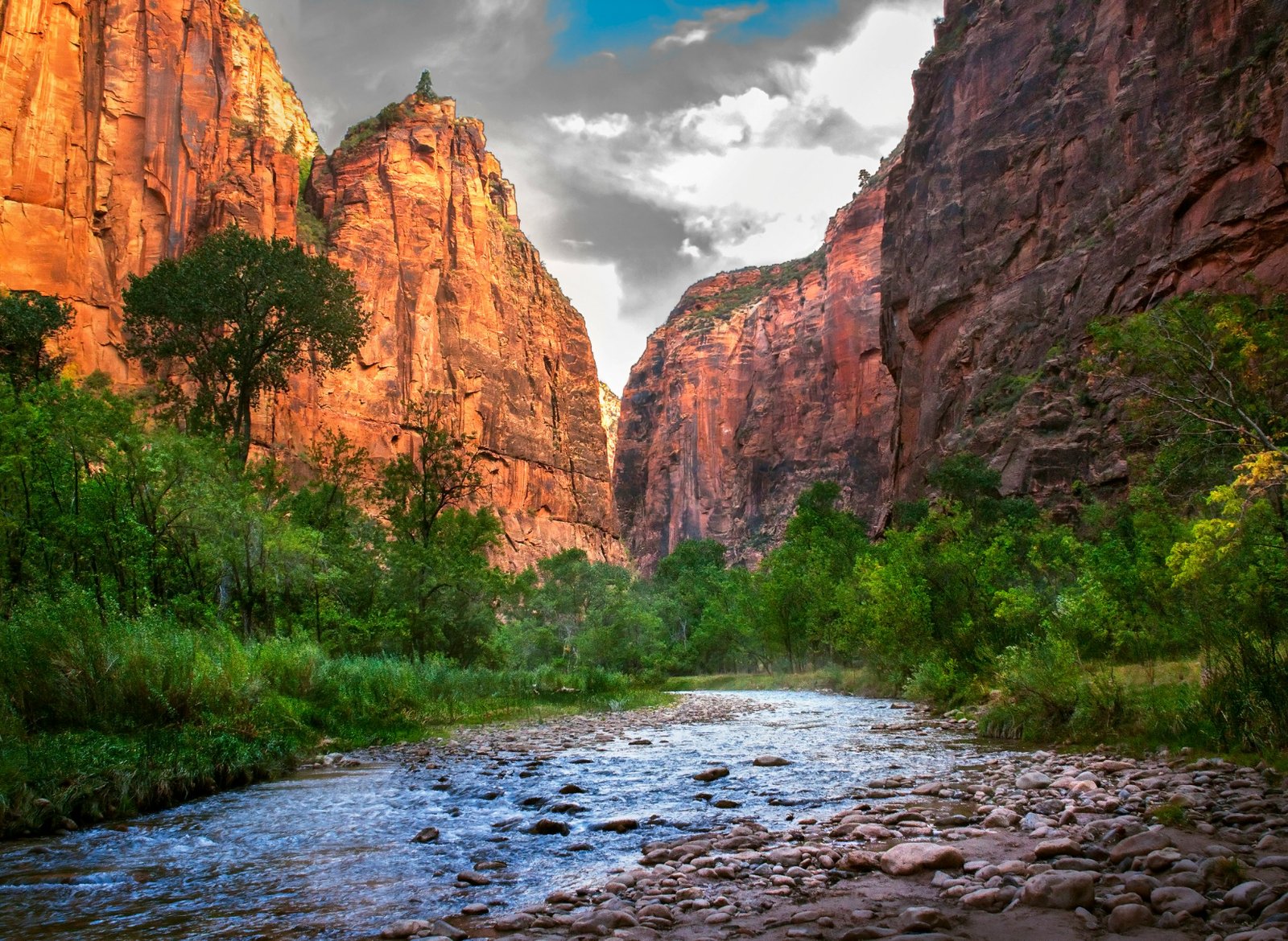 The Virgin River between towering sandstone walls, Zion Canyon